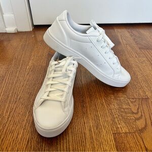 Adidas Sleek White Sneakers with Gold Accents